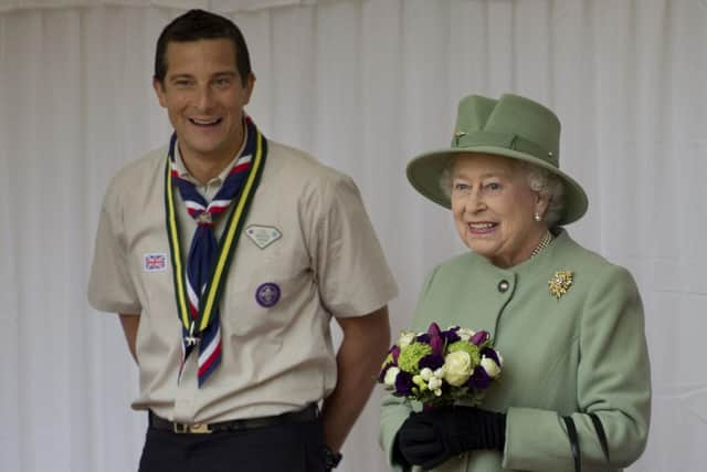 Bear Grylls and the late Queen Elizabeth II (Photo: Getty Images)