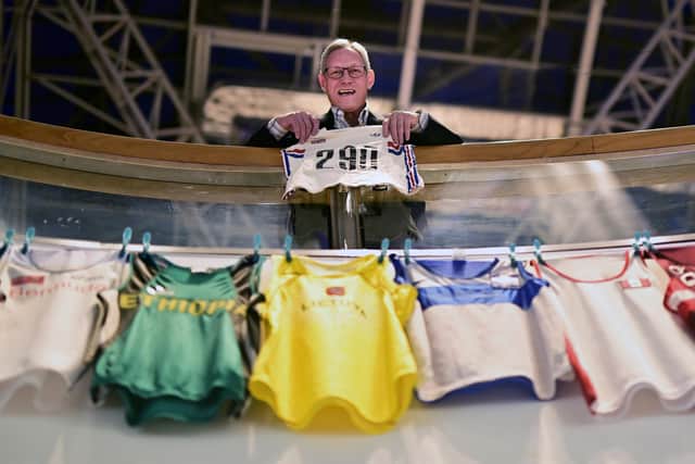 Allan Wells holds a shirt he is contributing to the Museum of World Athletics. Picture: John Devlin