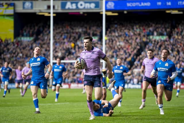 No-one is catching Blair Kinghorn as he scores a brilliant hat-trick try for Scotland against Italy. (Photo by Ross MacDonald / SNS Group)