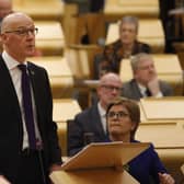 Deputy First Minister John Swinney MSP was watched by First Minister Nicola Sturgeon as he delivered his budget to the Scottish Parliament.Picture: Andrew Cowan/Scottish Parliament/PA Wire