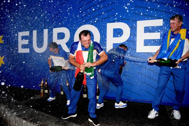 Francesco Molinari celebrates the 2018 Ryder Cup win in Paris when he became the first European player to compile a perfect 5-0 record.
