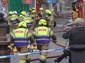 More than 100 firefighters have been involved in battling the large fire on George IV Bridge. Pic: Matt Donlan