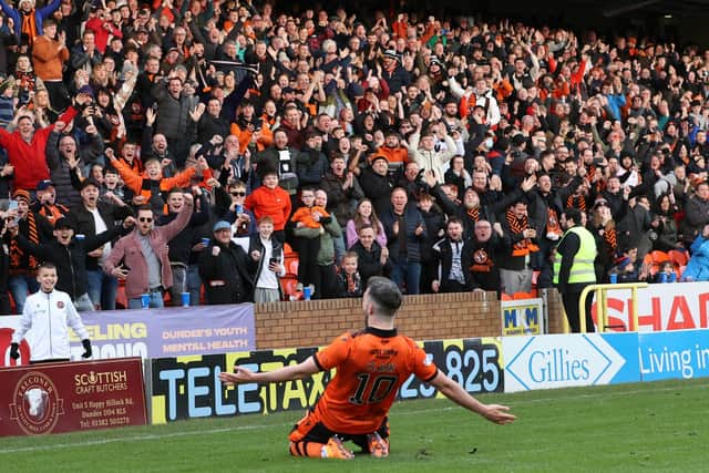Dundee United's Nicky Clark celebrates after making it 2-1 from the penalty spot.  (Photo by Alan Harvey / SNS Group)