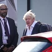 Former Prime Minister Boris Johnson arrives at Gatwick Airport in London, after travelling on a flight from the Caribbean, following the resignation of Liz Truss as Prime Minister.