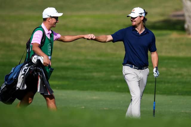 Norwegian Espen Kofstad celebrates with his caddie, Carnoustie man Paul Drummond, after  holing his seond shot for an eagle at the 14th in the first round of the Rolex Challenge Tour Grand Final supported by The R&A at T-Golf & Country Club in Mallorca. Picture: Octavio Passos/Getty Images.
