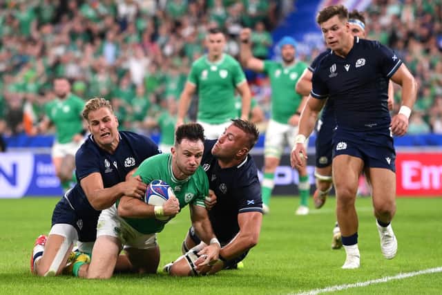 Hugo Keenan scores Ireland's fourth try in the win over Scotland. (Photo by Stu Forster/Getty Images)