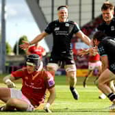 George Horne goes to congratulate Sebastian Cancelliere after the winger scored Glasgow Warriors' second try in the 17-10 win over Munster in the BKT United Rugby Championship semi-final at Thomond Park, Limerick, on 15 June 2024.  (Photo by Ben Brady/INPHO/Shutterstock)