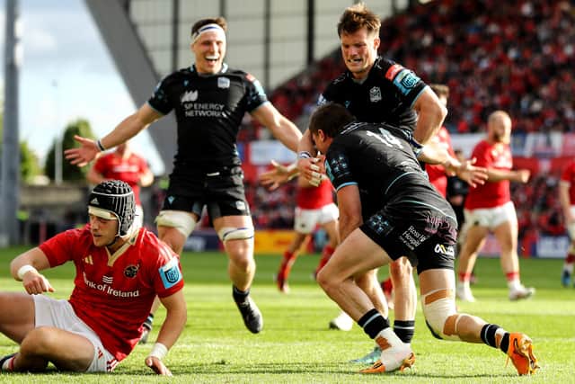 George Horne goes to congratulate Sebastian Cancelliere after the winger scored Glasgow Warriors' second try in the 17-10 win over Munster in the BKT United Rugby Championship semi-final at Thomond Park, Limerick, on 15 June 2024. (Photo by Ben Brady/INPHO/Shutterstock)