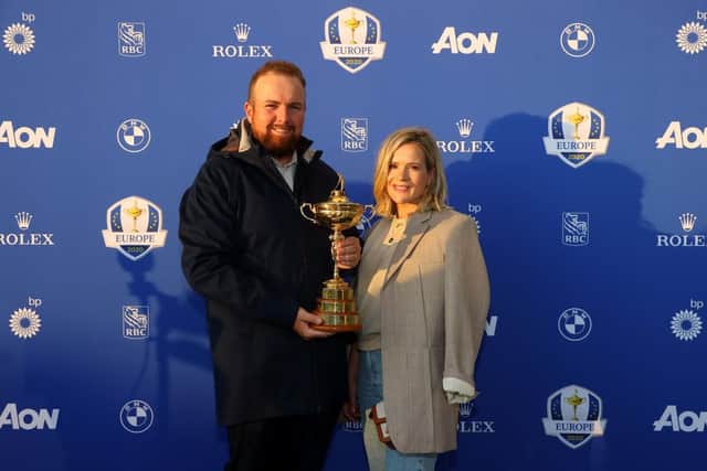 Shane Lowry wife Wendy pose with the Ryder Cup Trophy before departing Heathrow Airport. Picture: Andrew Redington/Getty Images.