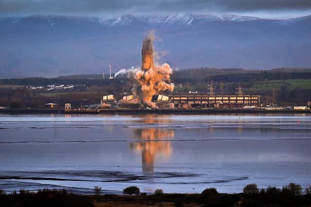 The 600ft chimney at the former Longannet coal-fired power station is demolished (Picture: Jeff J Mitchell/Getty Images)
