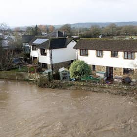 As Storm Chandra caused widespread disruption across the UK and Ireland, the River Axe flooded homes in Axminster, England (Picture: Finnbarr Webster/Getty Images)