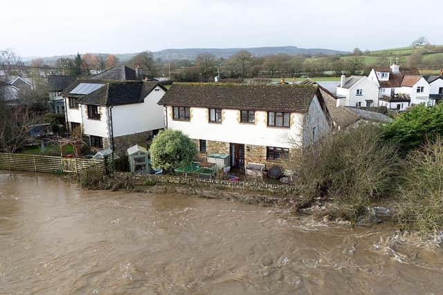As Storm Chandra caused widespread disruption across the UK and Ireland, the River Axe flooded homes in Axminster, England (Picture: Finnbarr Webster/Getty Images)