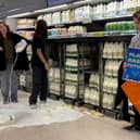 Handout photo issued by Animal Rebellion of supporters of Animal Rebellion pouring out milk in a Waitrose in Edinburgh. Issue date: Saturday October 15, 2022.