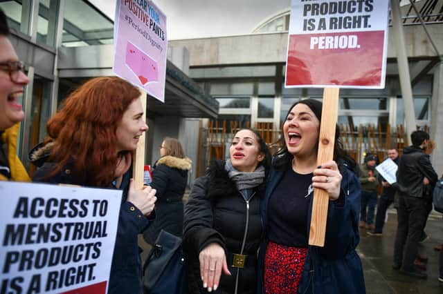 Scottish Labour MSP Monica Lennon, right, joins campaigners during a rally in February outside the Scottish Parliament in support of Period Products Bill (Picture: Jeff J Mitchell/Getty Images)