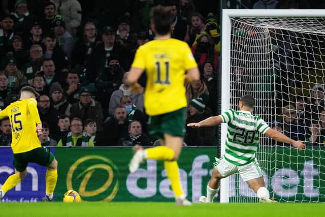 Hibs striker Kevin Nisbet misses a big early chance at Celtic Park.