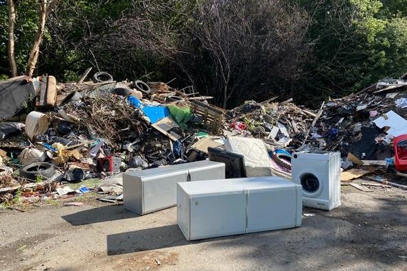 This site Newcraighall Road in Edinburgh is among a number owned by Network Rail which have been targeted by large-scale fly-tipping. Areas affected inlcude old sidings areas and leased railway yards. Sturdier fencing has been installed to make further dumping more difficult.