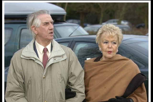 Johnnie Beattie walks with Mary Lee, widow of Jack Milroy. Picture: Donald MacLeod