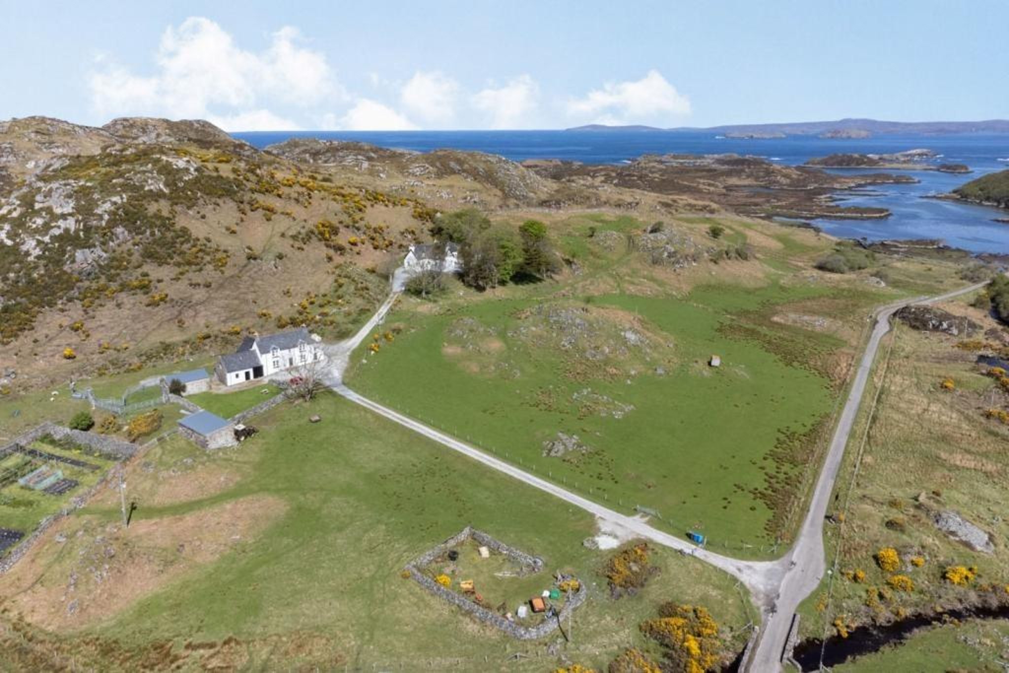 Highland haven for sale with 5-bedroom lodge house, 2-bedroom farmhouse and only the spectacular north west coastline for company