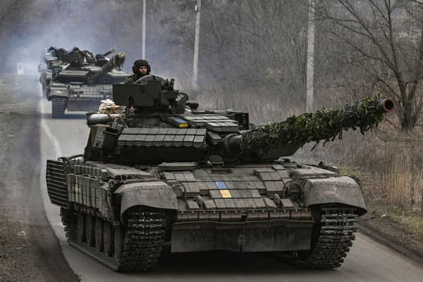 Ukrainian T64 tanks move towards Bakhmut, in Donetsk, amid bitter fighting over the town (Picture: Aris Messinis/AFP via Getty Images)
