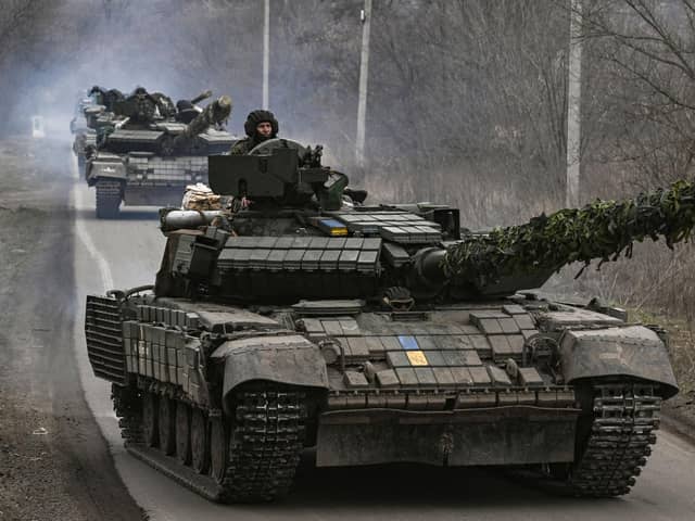 Ukrainian T64 tanks move towards Bakhmut, in Donetsk, amid bitter fighting over the town (Picture: Aris Messinis/AFP via Getty Images)