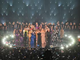 Duncan Laurence performs "You'll Never Walk Alone" on stage during The Eurovision Song Contest. Groups of singers from Ukraine joined in via video link, while all entrants in the competition also joined him on stage.