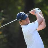 Marc Warren tees off on the fourth hole during Day one of the DP World Tour Championship at Jumeirah Golf Estates last month. Picture: Ross Kinnaird/Getty Images.