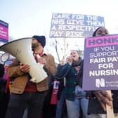 Members of the Royal College of Nursing (RCN) on the picket line south of the border. Members in Scotland have also voted for strike action. Picture: James Manning/PA Wire