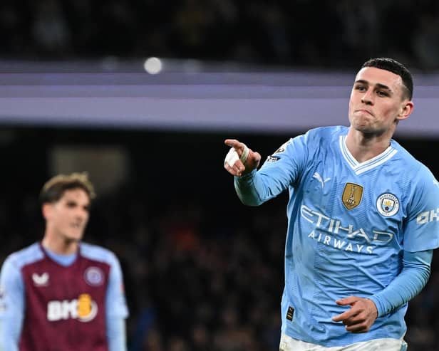 Manchester City's Phil Foden celebrates after scoring his team third goal against Aston Villa.
