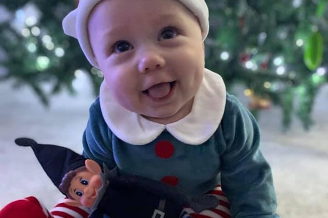 Georgia Naylor shared this adorable photo of her baby with Elf on the Shelf.