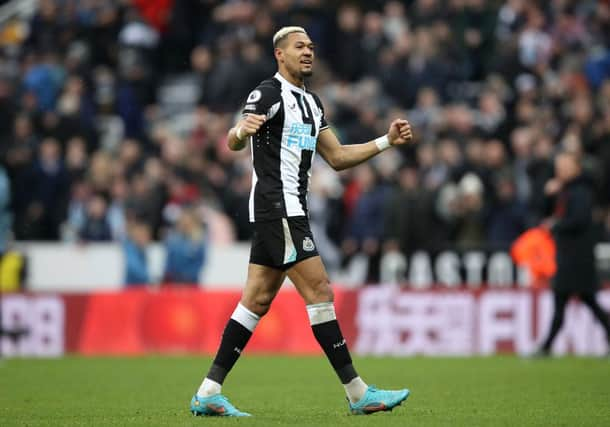 Joelinton of Newcastle United celebrates their sides victory after the Premier League match between Newcastle United and Aston Villa at St. James Park on February 13, 2022 in Newcastle upon Tyne, England. (Photo by George Wood/Getty Images)