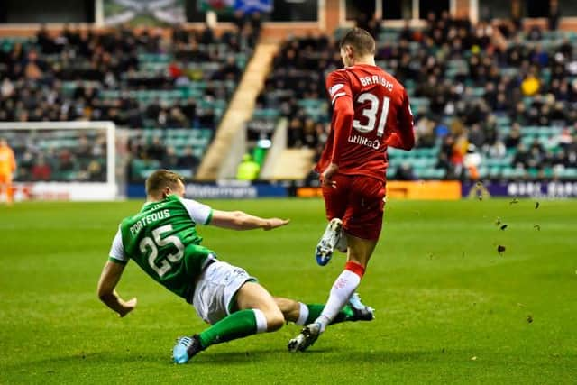 Borna Barisic is fouled by Ryan Porteous who is red carded. (Photo by Rob Casey / SNS Group)