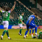 Alfredo Morelos stamps on Ryan Porteous during the first half of the Hibs-Rangers match on Wednesday