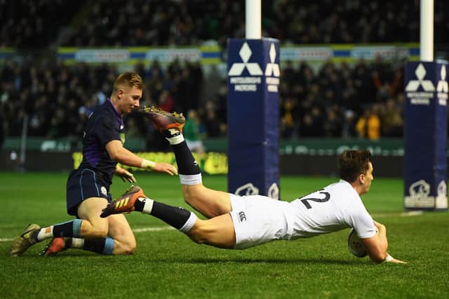 Cameron Redpath scores a try for England U20 against Scotland U20 at Franklin's Gardens in 2019. The centre is now part of the Scotland squad.
