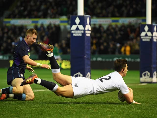 Cameron Redpath scores a try for England U20 against Scotland U20 at Franklin's Gardens in 2019. The centre is now part of the Scotland squad.