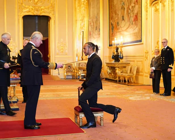 Sir Lewis Hamilton is made a Knight Bachelor by the Prince of Wales at Windsor Castle. Hamilton has been knighted in recognition of a glittering career in Formula One