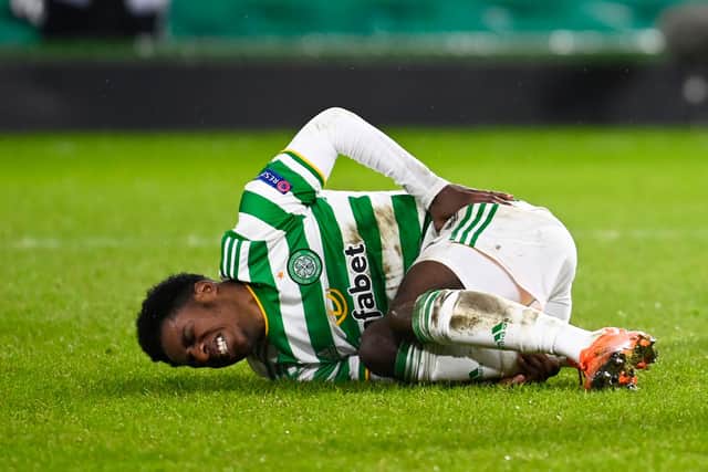 Jeremie Frimpong lies on the deck after being fouled for Celtic's penalty. Picture: SNS