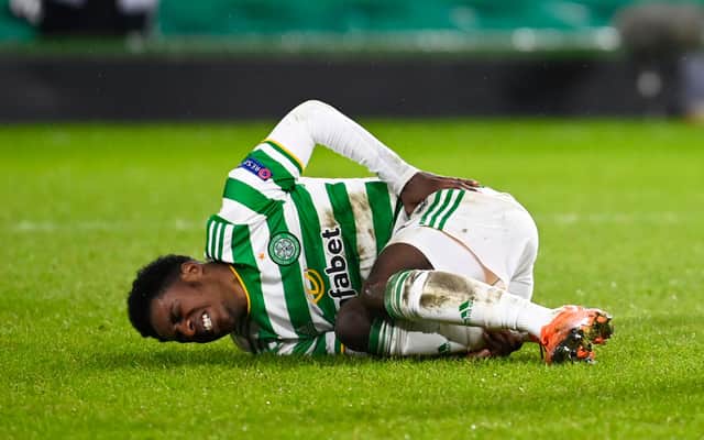 Jeremie Frimpong lies on the deck after being fouled for Celtic's penalty. Picture: SNS