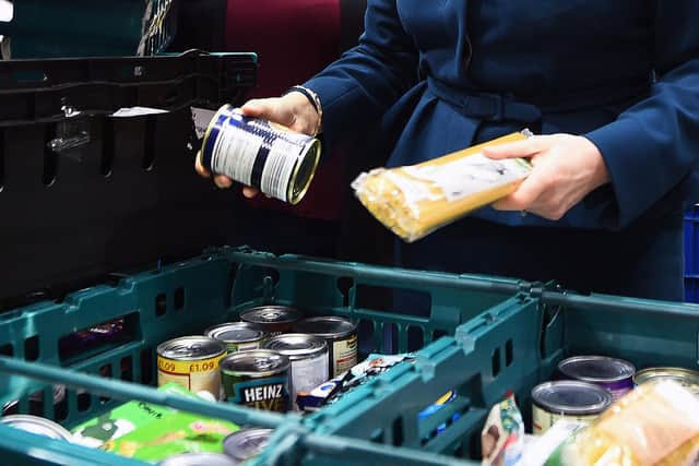 Foodbanks have become part of everyday life for people living in poverty despite having a job (Picture: PA)