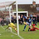 Sean Brown scrambles the opening goal over the line after Cowdenbeath had been reduced to ten men. Joe Gilhooley LRPS