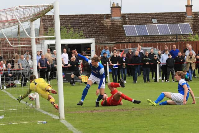 Sean Brown scrambles the opening goal over the line after Cowdenbeath had been reduced to ten men. Joe Gilhooley LRPS