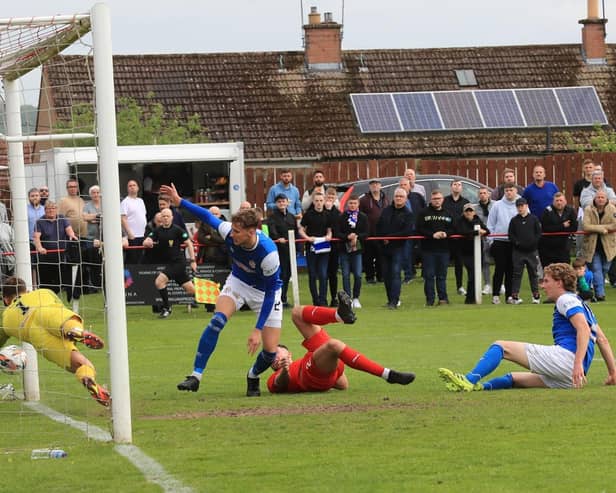 Sean Brown scrambles the opening goal over the line after Cowdenbeath had been reduced to ten men. Joe Gilhooley LRPS