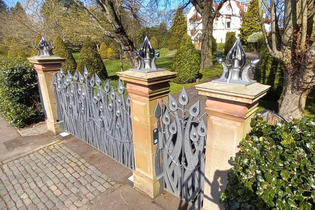 The gates take inspiration from the Arts and Crafts movement, in keeping with detailing inside the house they protect