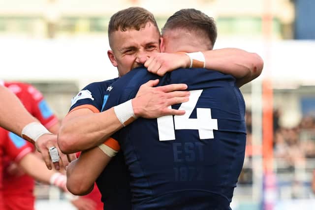 Ben Vellacott, left, celebrates with Darcy Graham who scored two tries in Edinburgh's United Rugby Championship win over Scarlets. Picture: Paul Devlin/SNS