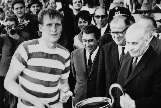 Billy McNeill is presented with the European Cup after the 2-1 victory over Inter Milan in Lisbon.