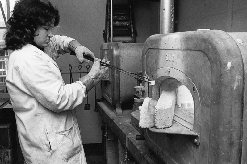 Molten gold and silver is removed from the furnace to be cooled and analysed, 1974 (ref no S40072)