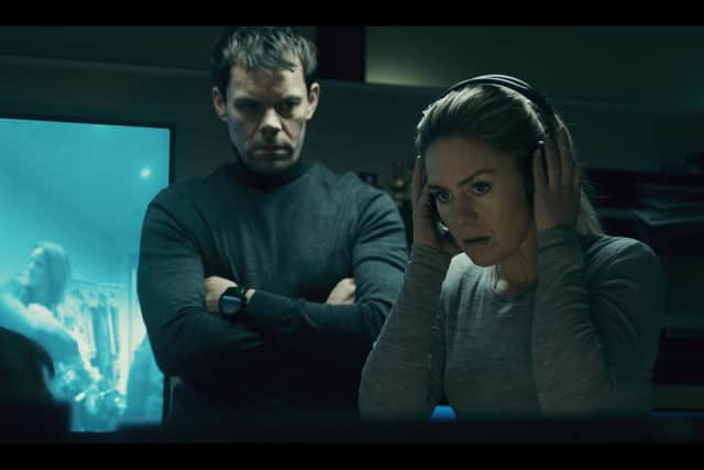 Kata (Nina Dogg Filippusdottir) and Arnar (Bjorn Thors) listening for clues in The Valhalla Murders