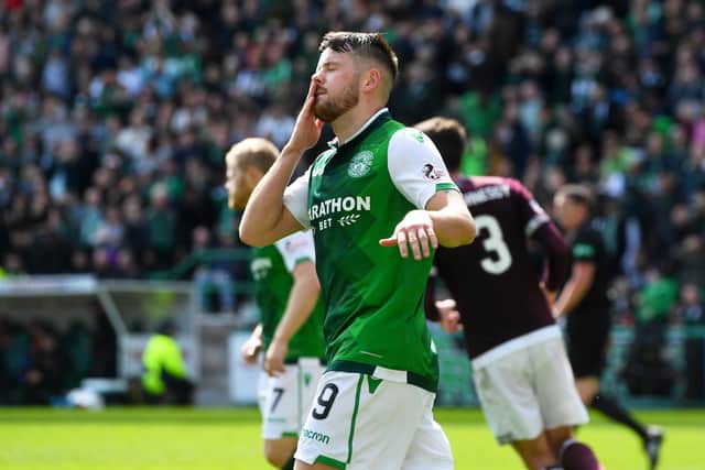 Marc McNulty can't bear to look after sending his penalty wide against Hearts while playing for Hibs in an Edinburgh derby in April 2019. It finished 1-1