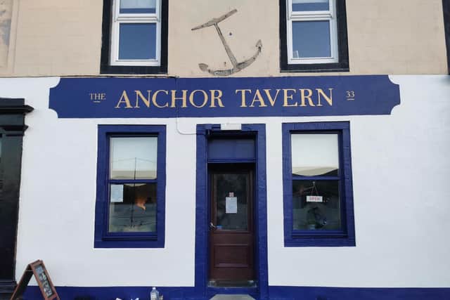 The Anchor Tavern in Port Bannantyne, the last pub in the village to remain open and which is now owed and run by the local community. PIC: Contributed.