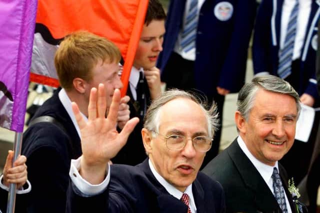 Donald Dewar waves to the crowd at the opening of the Scottish Parliament in July 1999 (Picture: Ian Stewart/AFP via Getty Images)