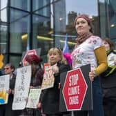 Climate campaigners from Extinction Rebellion Scotland protest outside the Pensions and Lifetime Savings Association Conference at the Edinburgh International Conference Centre (EICC), to highlight the flawed climate risk models used by pension funds and to call on the funds to stop investing in fossil fuels. Picture: Jane Barlow/PA Wire